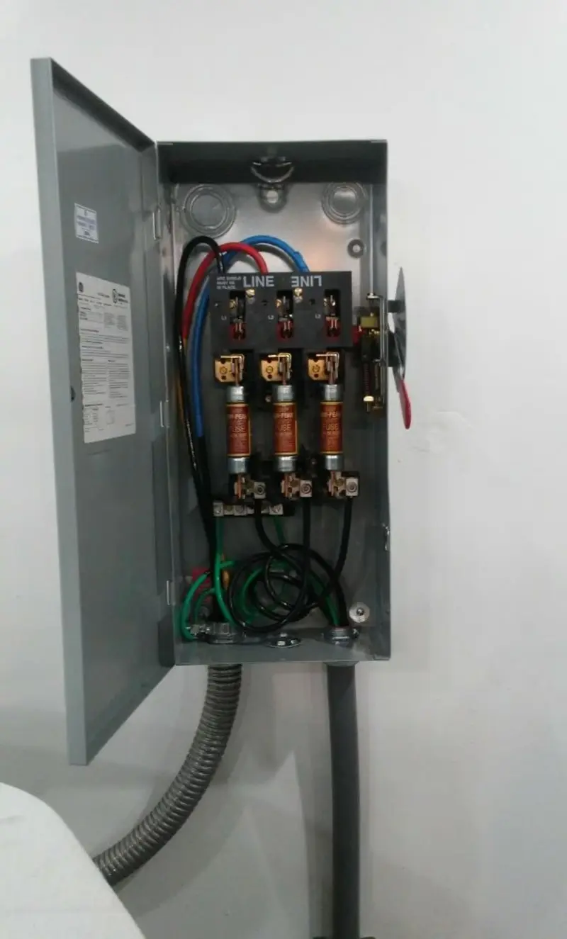 Three-phase disconnect switch installed for Smoke Detector Installation in Malabar